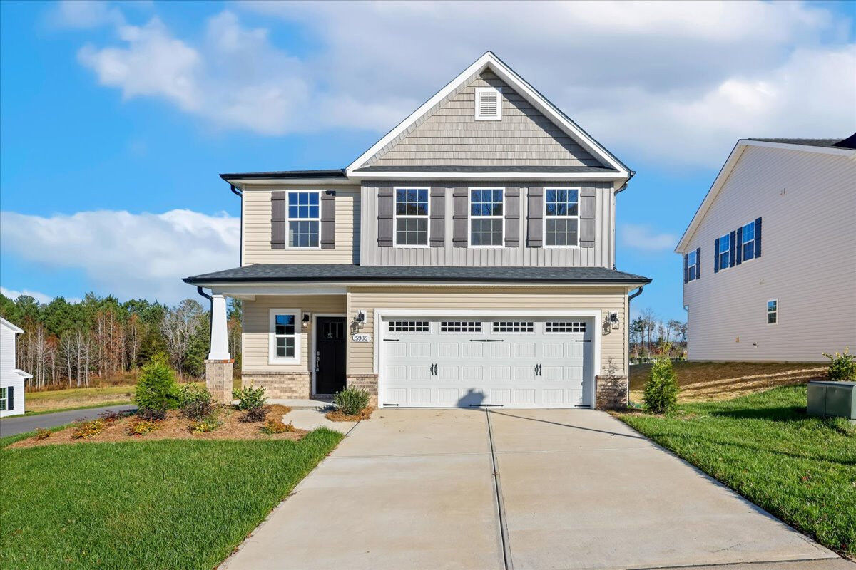 https://assets.windsorhomes.us/img/OWL_lot2_Columbia_C_5985_Elk Ridge_Dr_exterior_full_front.jpg